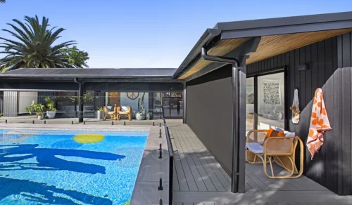 Shannon voss's outdoor are comes alive with wynstan straight drop awnings.