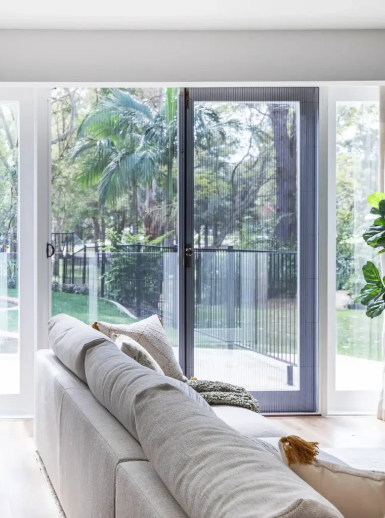 Sheer curtains and retractable flyscreen