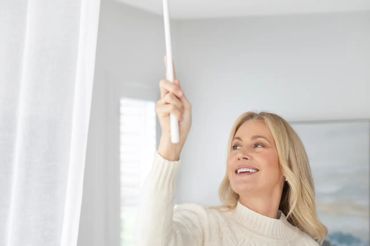 Sheer curtain with wand control